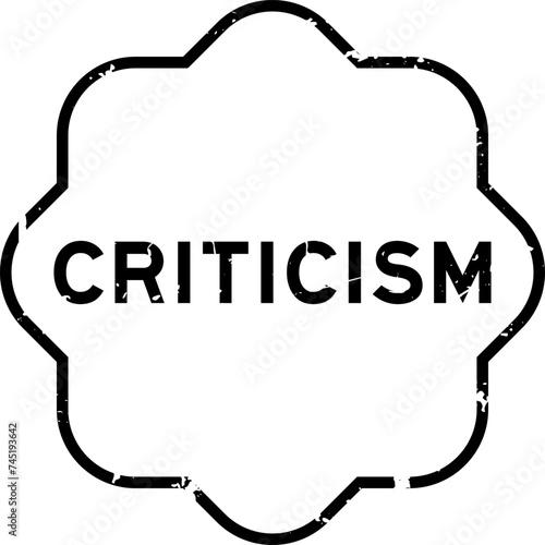 Grunge black critcism word rubber seal stamp on wthie background