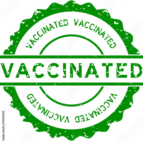 Grunge green vaccinated word round rubber seal stamp on white background