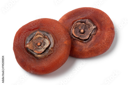 Pair of dried kaki persimmon isolated on white background close up © Picture Partners