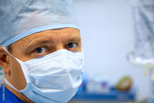 Mature male surgeon in operation room