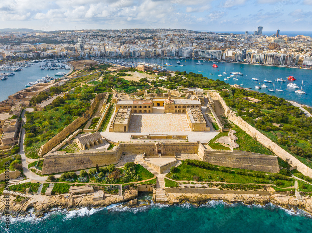 Drone view of Fort Manoel, Sliema city on background. Malta country