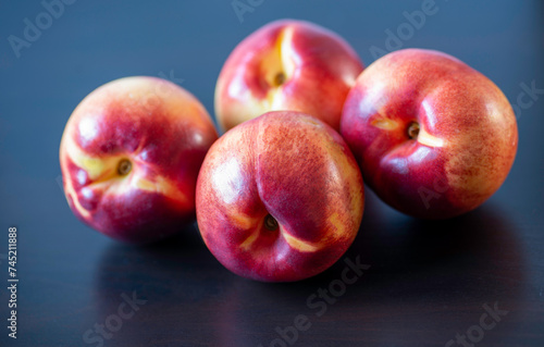 Delicious peaches, close up view with black, dark background