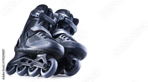 A pair of black inline skates isolated on white background photo