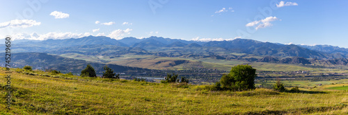 Potskhovi river valley panorama in Samtskhe - Javakheti region with Akhaltsikhe town, Georgia with Lesser Caucasus mountains in the background, summer.