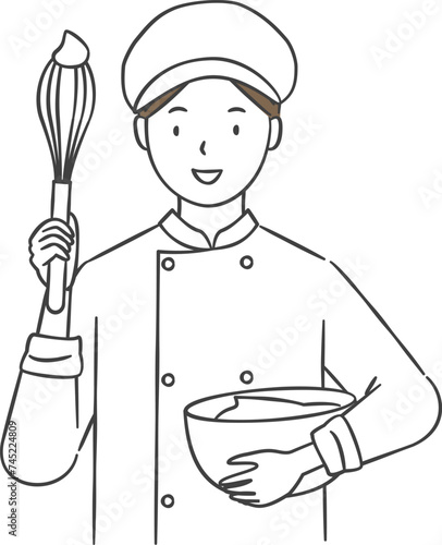 泡立てをするパティシエ