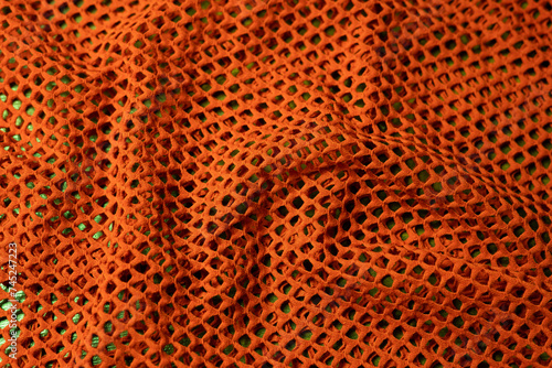 orangener Netz Stoff als Hintergrund