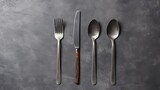 Vintage cutlery set on gray surface