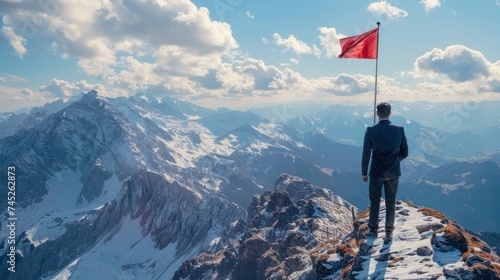 A businessman sets his sights on the flag atop the mountain, establishing goals and expectations