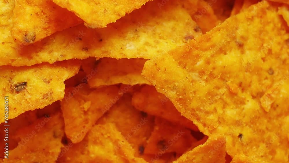 Nacho chips texture. Close up. Food background. Tasty snacks Nacho chips texture. Close up. Food background. Tasty snacks