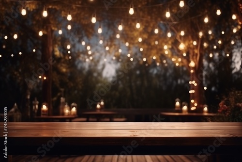 Wallpaper Mural Wood table top with outdoor string lights hanging on tree in garden at night, fairy lights Torontodigital.ca