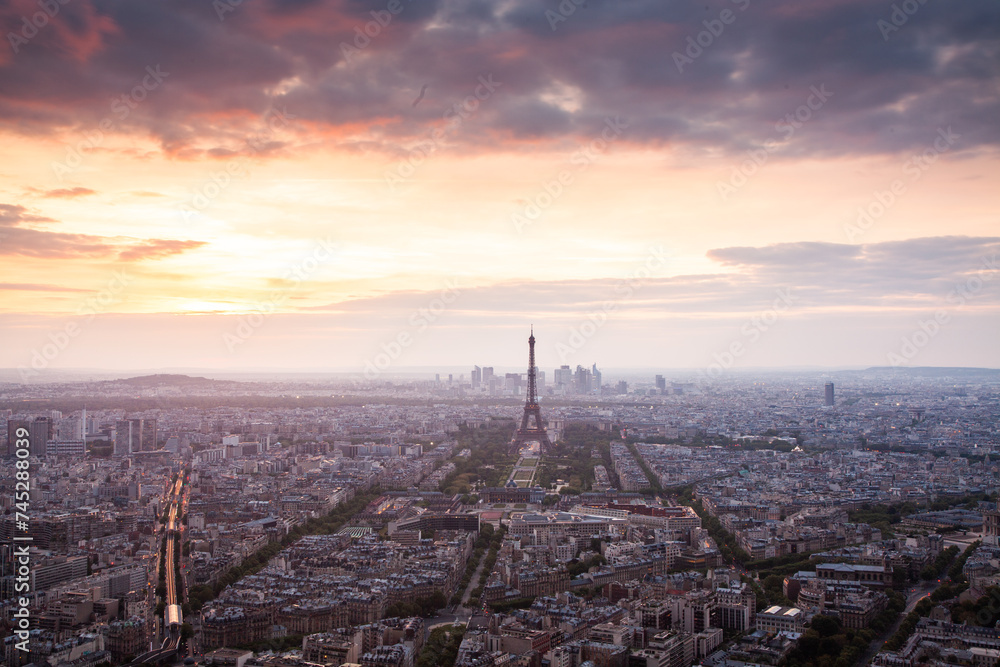 skyline of Paris with Eiffel Tower at sunset in Paris, France