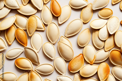 A Pile of Pumpkin Seeds on a Table © Piotr