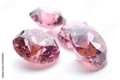 Three Pink Diamonds on a White Background