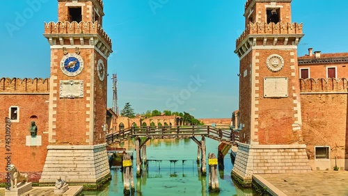 VENICE, ITALY - APRIL 26, 2018: Venetian Arsenal is complex of former shipyards and armories clustered together. Owned by state, Arsenal was responsible for bulk of the Venetian republic's. photo