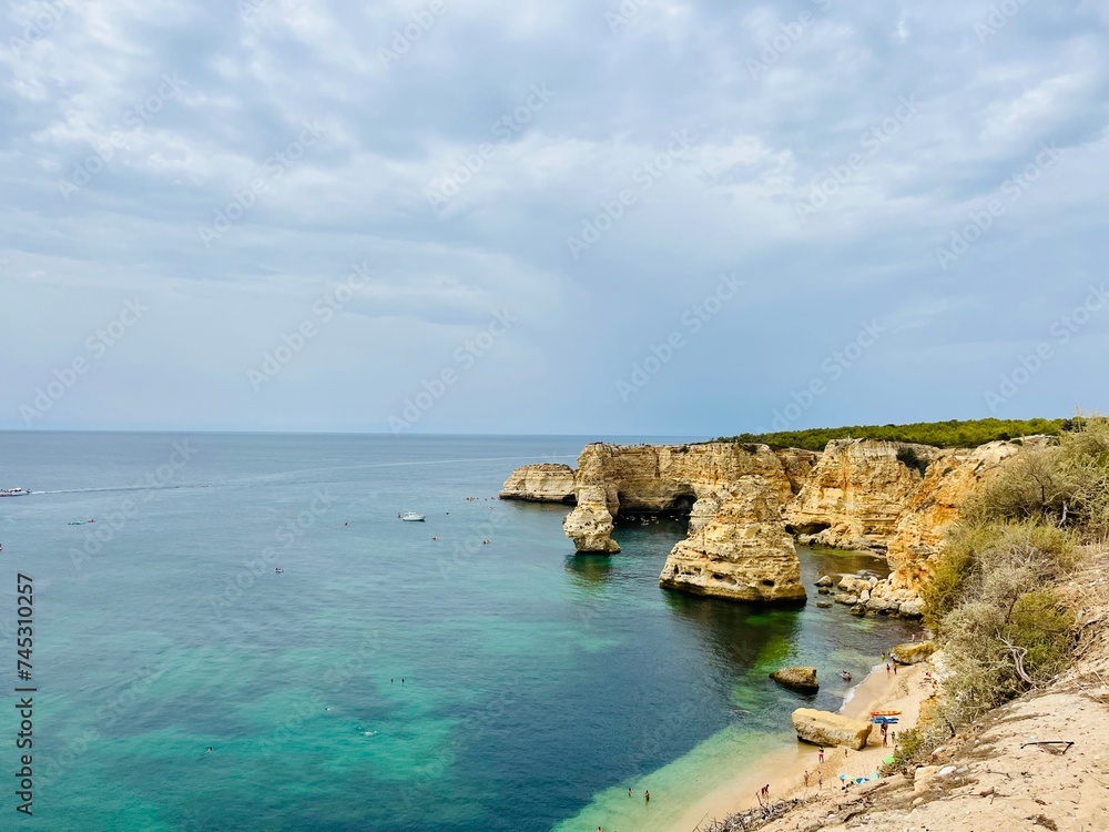 Rocky coastline, ocean horizon, rocks at the ocean, cliffs