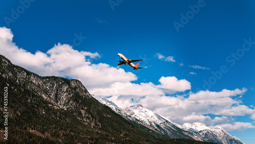 Airplane taking off from Innsbruck airport.