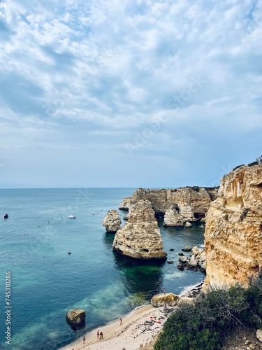 Rocky coastline, ocean horizon, rocks at the ocean, cliffs