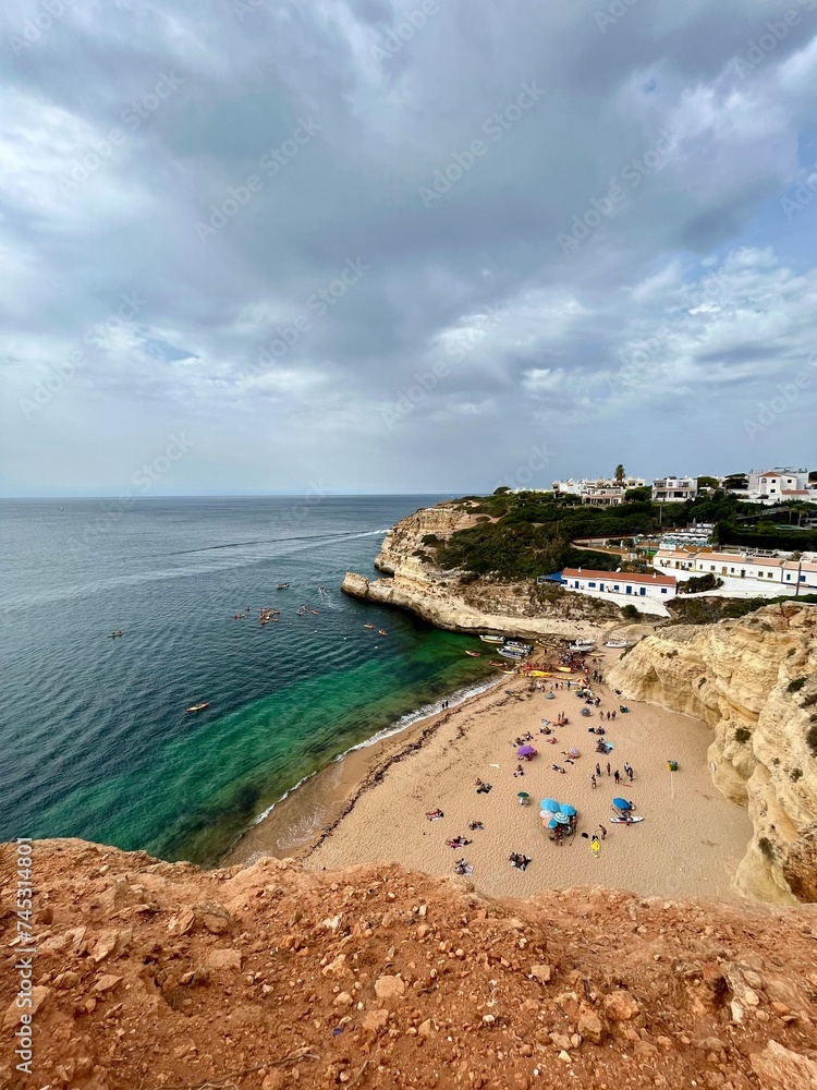 Fototapeta premium Amazing sand beach at the rocky ocean coast