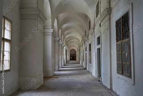 Prague, Czech Republic — June 17, 2023 - Long hallway of Invalidovna — baroque building for war veterans © Ivo