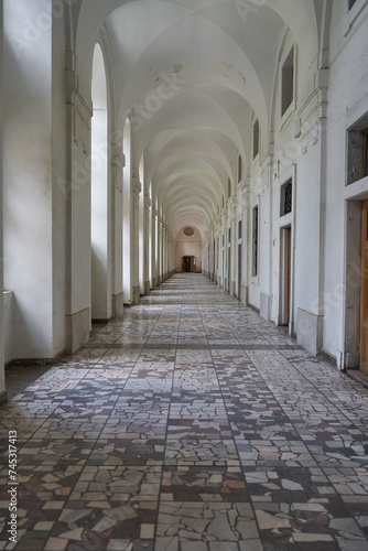 Prague, Czech Republic — June 17, 2023 - Long hallway of Invalidovna — baroque building for war veterans © Ivo