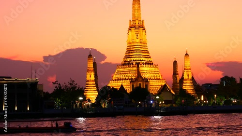Wat Arun or Temple of the Dawn, Bangkok. It is one of the most renowned temples for travel destinations in Bangkok. It is located next to Chao Praya river.   photo
