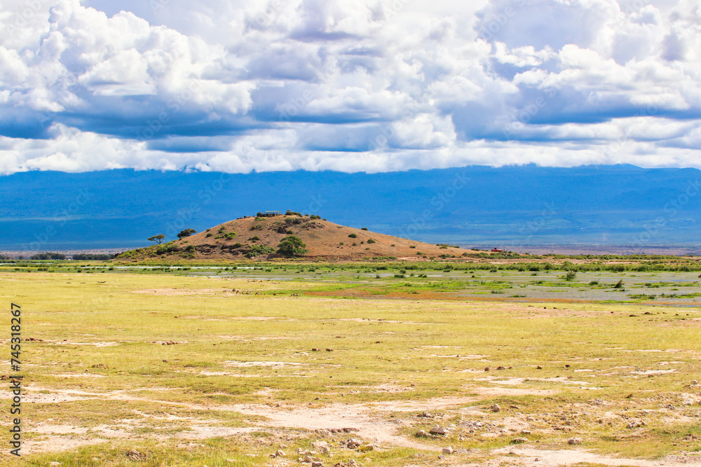 Sweeping panoramic vistas of the semi-arid savanna plains of the Amboseli national park, Kenya