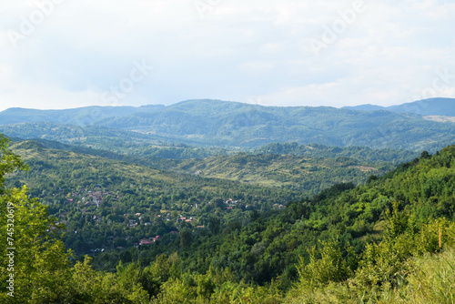 Spring mountain view of city village from Romania Carpathians top of mountain