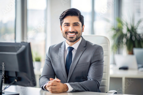 Young Hispanic Businessman in Business Suit: Portrait of Satisfied Boss Smiling and Looking at Camera Inside Office