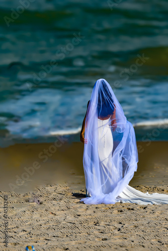 woman in white dress on the beach