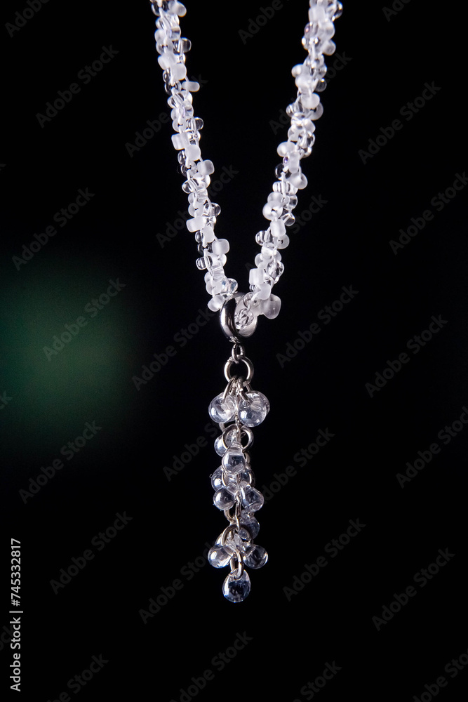 Pendant decoration with a pendant made of white small beads Pendant decoration with a pendant made of white small beads