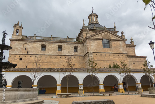 Lateral facade view at the Cerralbo chapelor or Iglesia de Cerralbo, a herrerian style Catholic church temple located in Ciudad Rodrigo, Salamanca, Spain photo