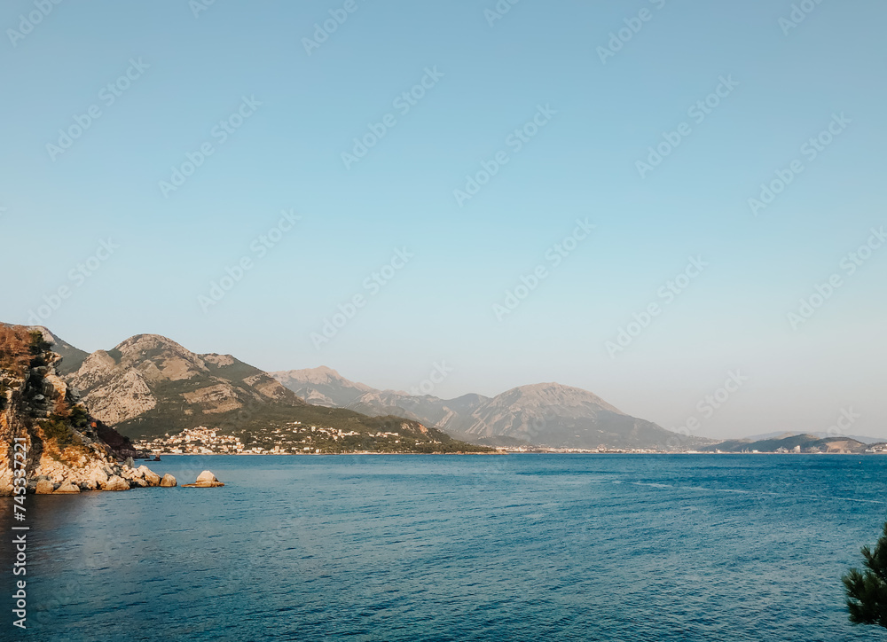 Top view Montenegro Sutomore stones beach blue turquoise Adriatic sea water mountains day