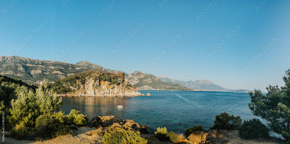 Top view Montenegro Sutomore stones beach blue turquoise Adriatic sea water mountains day