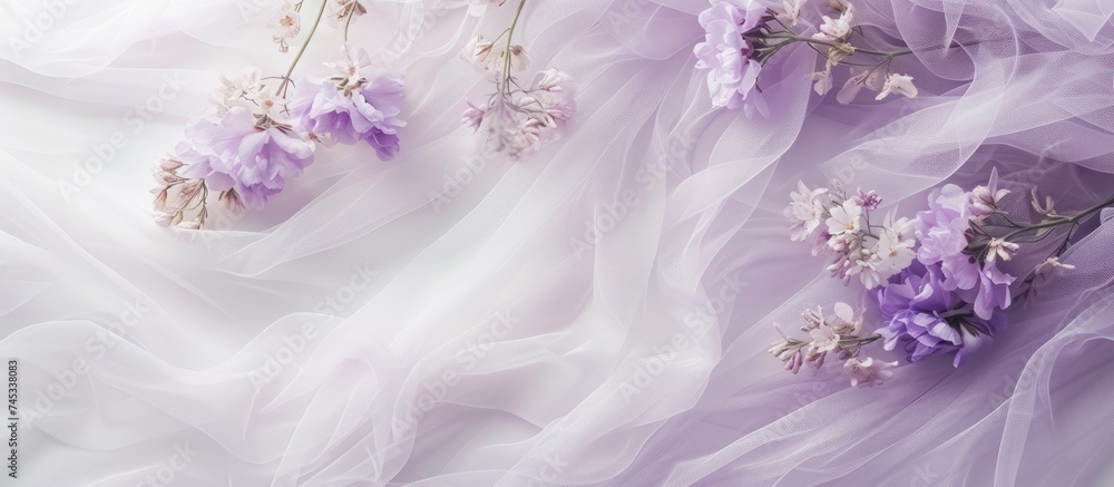 This close up showcases a lavender dress adorned with intricate, colorful flowers. The purple wedding dress features delicate details on white mesh tulle, creating an aesthetic background for the