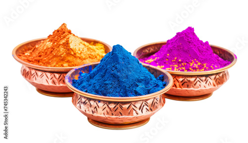 Holi powders in copper bowls. Colorful powder paint for indian spring of colors festival in pots. Isolated on background photo