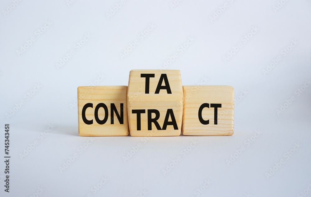 Contact and Contract symbol. Wooden cubes with words Contract and Contact. Beautiful white background. Contact and Contract and business concept. Copy space Contact and Contract symbol. Wooden cubes with words Contract and Contact. Beautiful white background. Contact and Contract and business concept. Copy space
