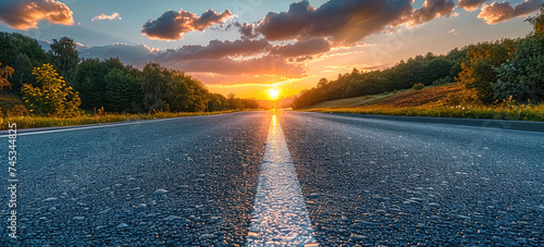 Empty asphalt road and beautiful sky at sunset. Generative AI.