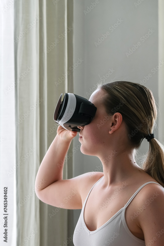 VR sport,Workout home vr,Fitness vr home,VR fit.Girl doing fitness in VR glasses home ,virtual reality exercise, immersive workout,VR sports,virtual gym,immersive spaces,futuristic environment VR sport,Workout home vr,Fitness vr home,VR fit.Girl doing fitness in VR glasses home ,virtual reality exercise, immersive workout,VR sports,virtual gym,immersive spaces,futuristic environment