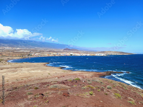 Panoramic view of desert coastal landscape with sea and blue sky. Deserts and extreme nature.