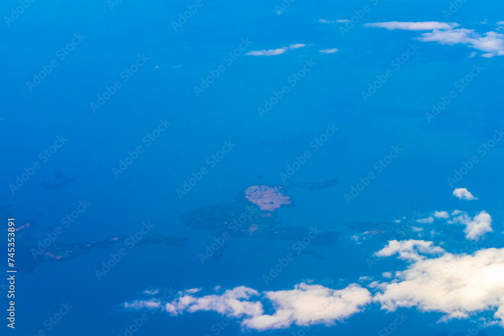 Fototapeta premium Flying in an airplane somewhere over the landscape of Costa Rica.