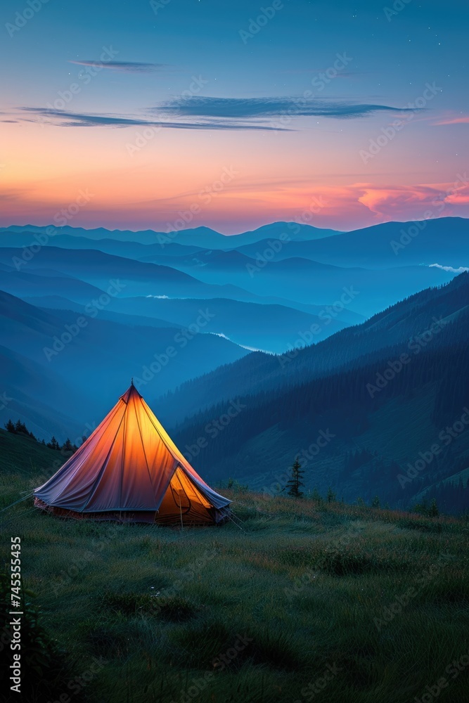 Camping under the twilight sky in the mountain wilderness