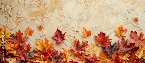 Autumn leaves on old paper background  top view  copy space