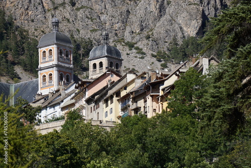 colorful church and buildings of the town of briançon  in the mountain in the southern alps, france