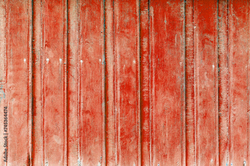 The old red wood texture with natural patterns The old red wood texture with natural patterns