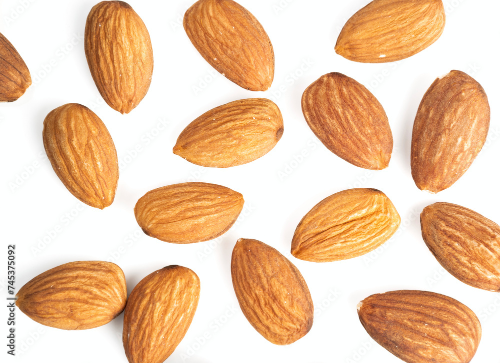 Fresh healthy almond nuts on white background. Fresh healthy almond nuts on white background.