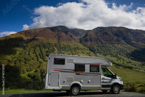 A motorhome stopped near Ben Nevis mountain in Fort William, Scottish Highlands