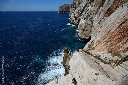 A stairway called Escala del Cabirol, cut into the cliff, leads from the top of the cliff at Capo Caccia down to the entrance to Neptune's Grotto photo
