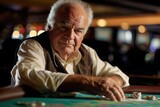 Elderly man at casino Baize table playing roulette