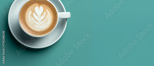 Cappuccino with Latte Art on Green Background - Aromatic Coffee Presentation