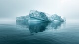 Floating iceberg in the ocean with reflection. Global warming concept